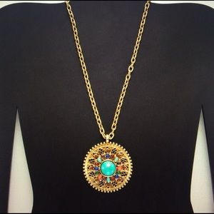 NWT - R. J. Granziano long gold floral pendant.