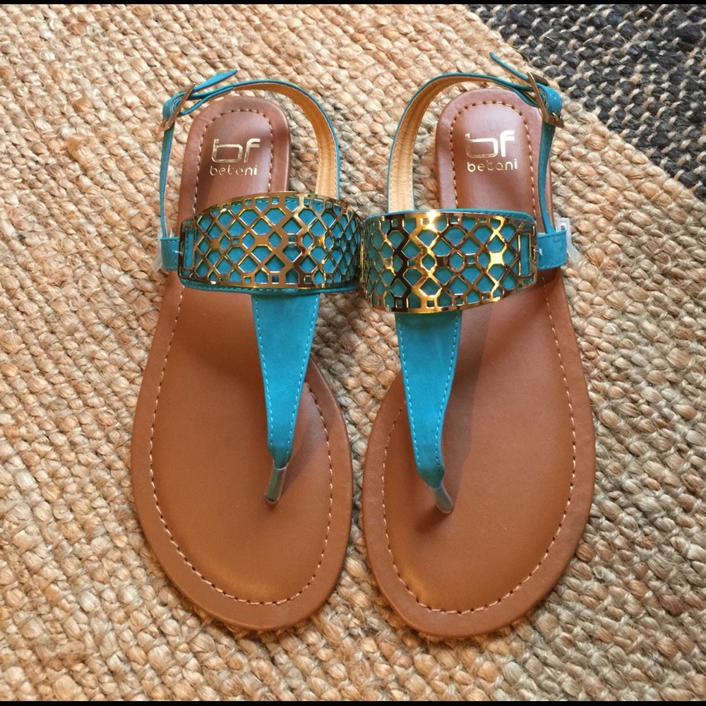 Women's teal flat sandals w gold embellishment