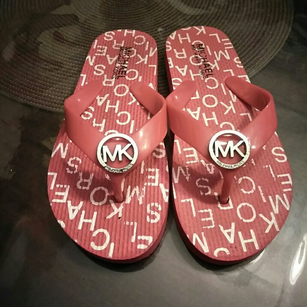 Girls red Mk flip flops
