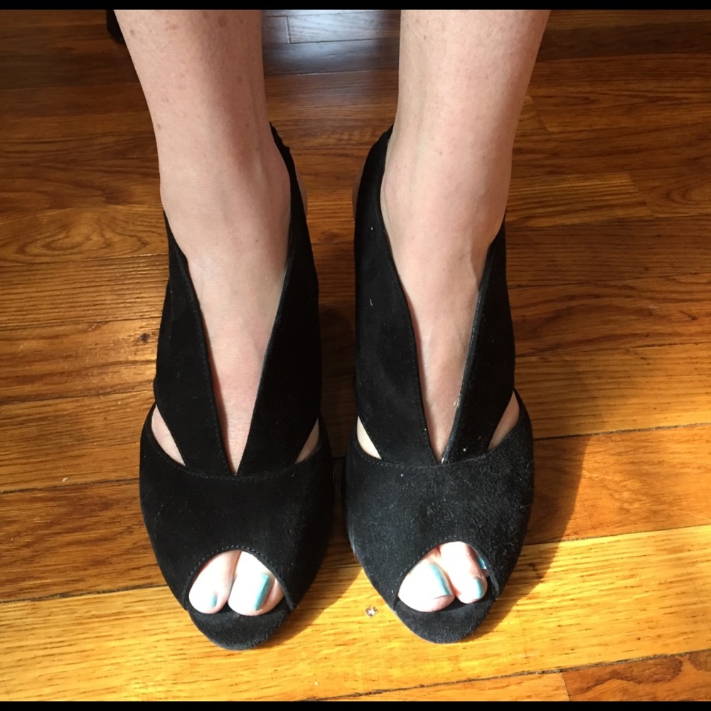 Eric Michael peep toe heels.