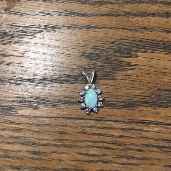 Delicate diamond and opal pendant