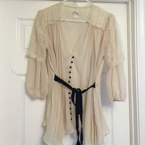 Pretty chiffon top with black buttons and lace