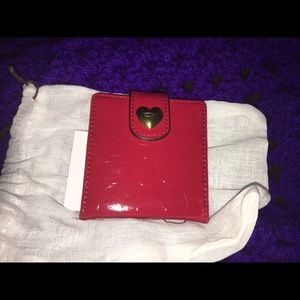Red coach signature mirror
