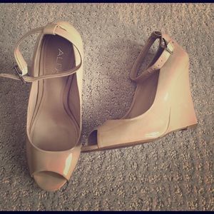Nude peep-toe wedges