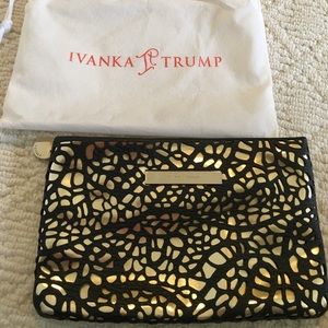 Black and gold Ivanka Trump clutch