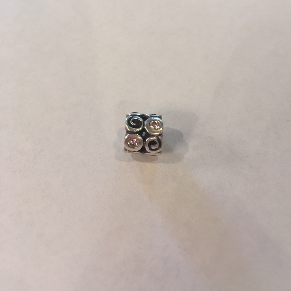 Pandora charm with pink diamond
