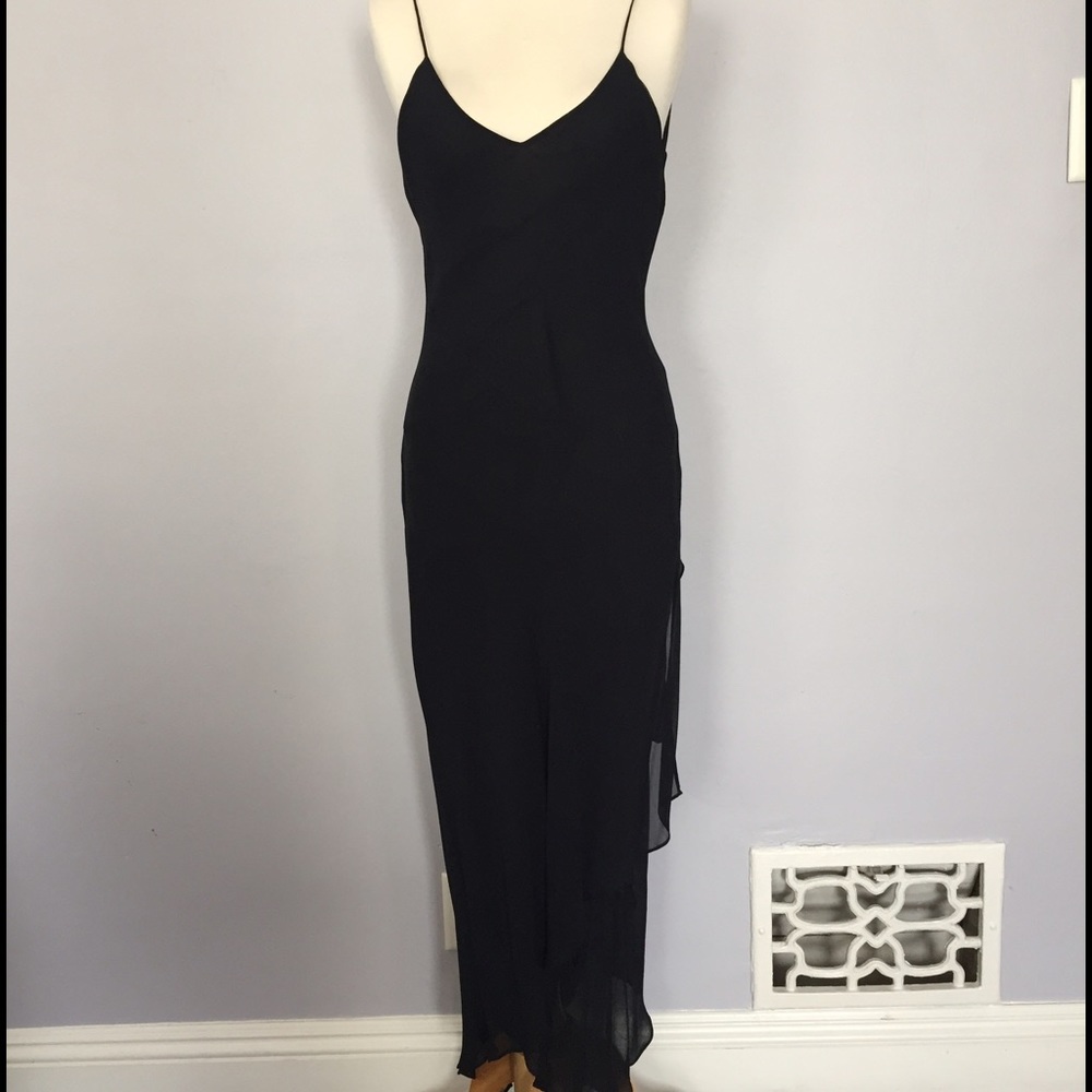 Fitted and flowing chiffon black dress.
