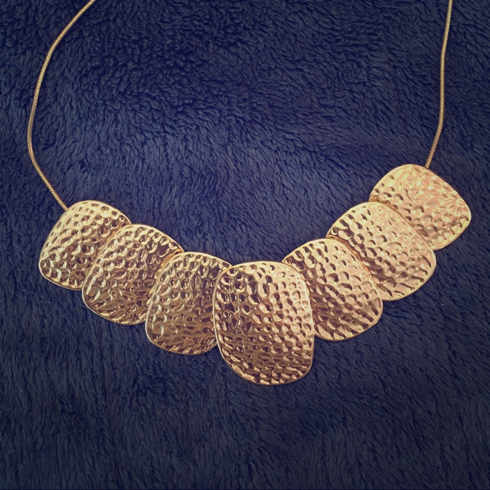 Gold color statement necklace