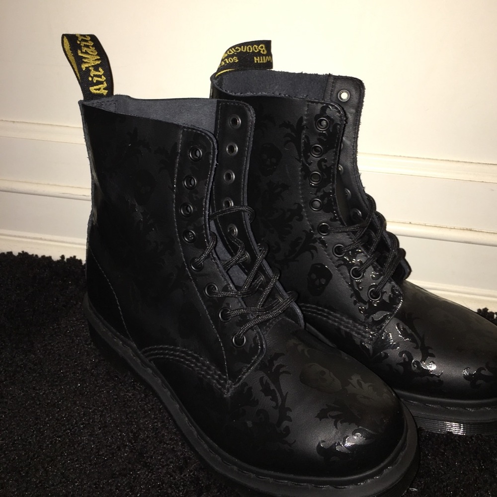 black matte doc martens with glossy designs