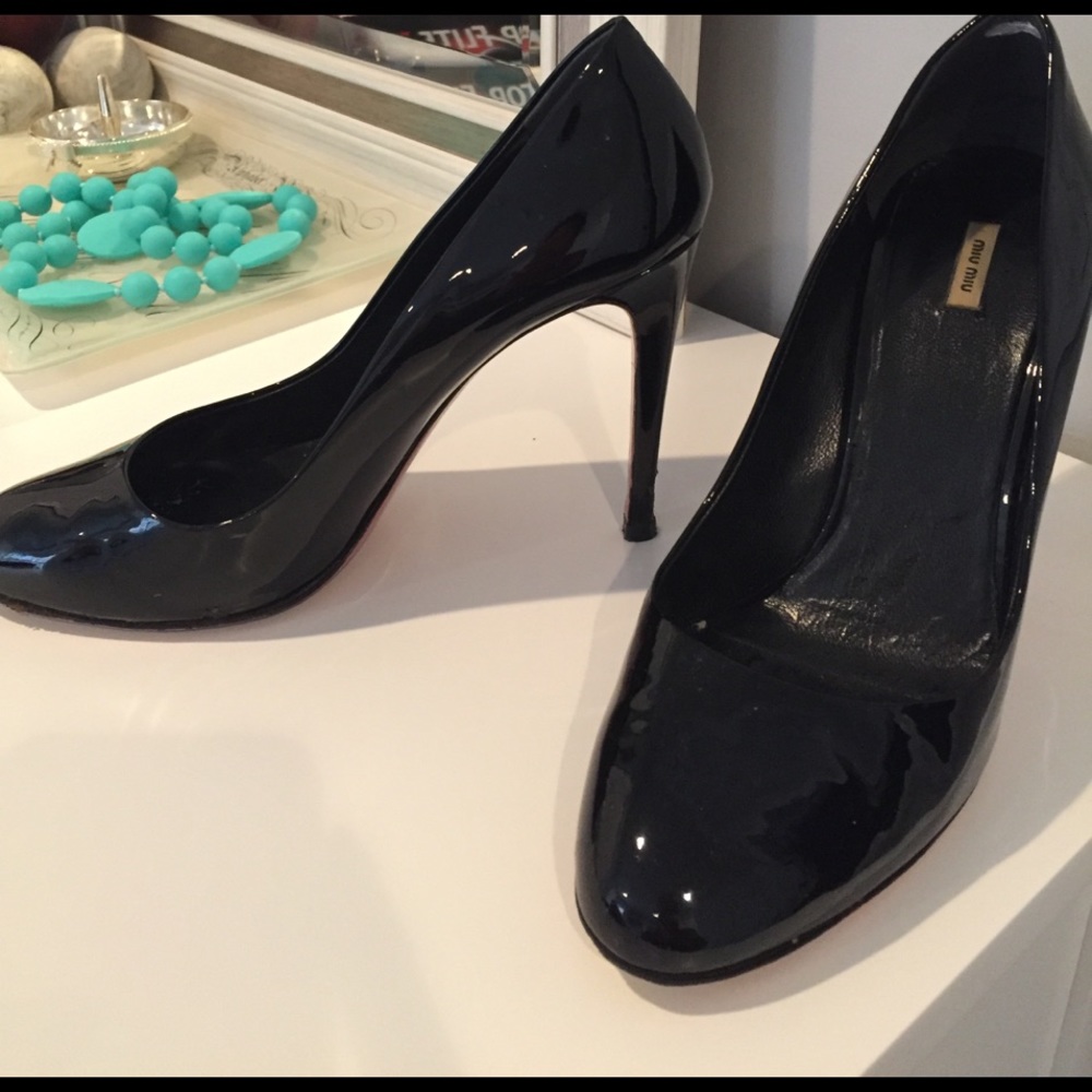 Miu Miu patent leather heels with hot pink bottoms