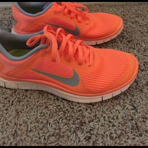 Orange Nike free brand new, never worn!
