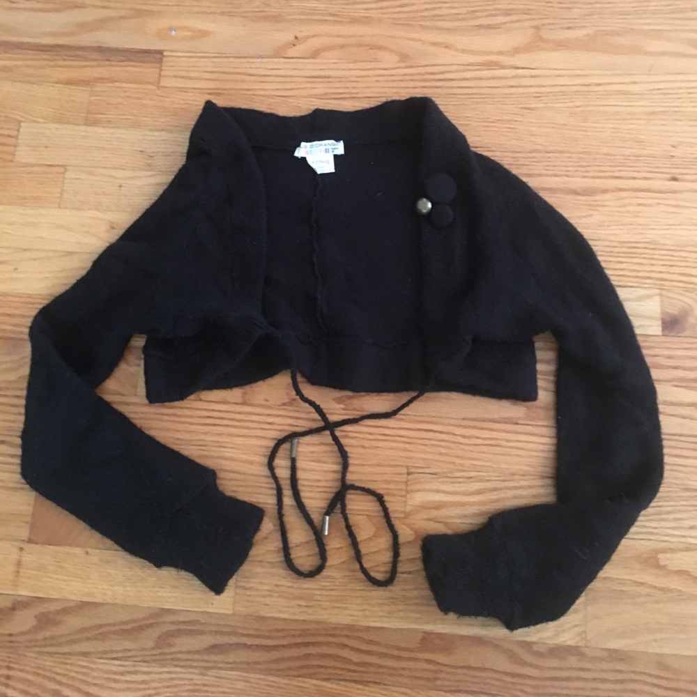 Black shoulder Shrug sweater. Tie Front