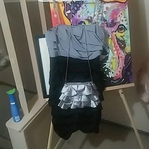 Black and grey ruffle dress with matching purse