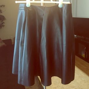 Bebe. Black faux leather skirt