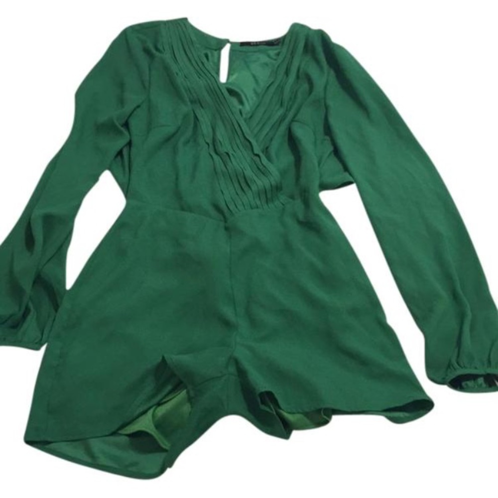 Green romper.