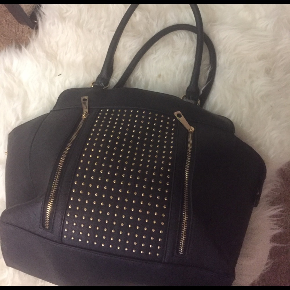 A black studded purse