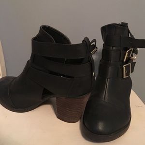 Black strapping boots