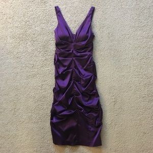 Deep purple dress.