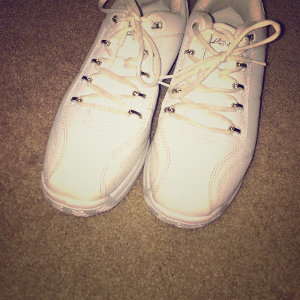 White pair of fubu shoes