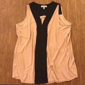 Tan and black sleeveless blouse