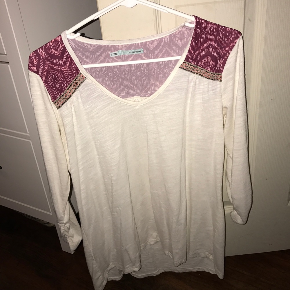 What with Aztec shirt