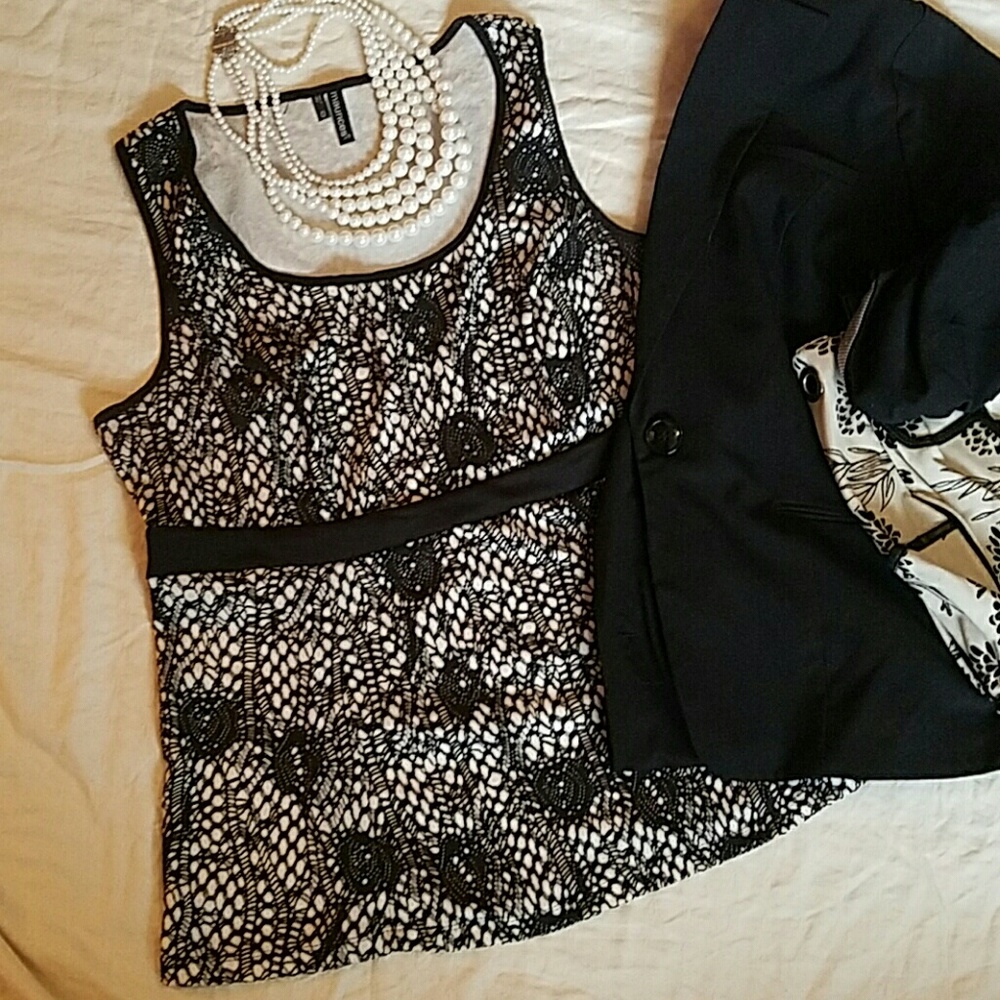 Cream and black top