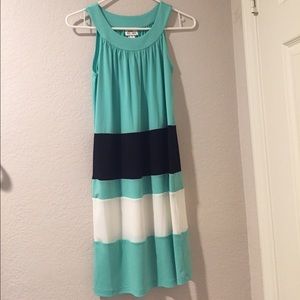 Sleeveless dress. Never been worn.