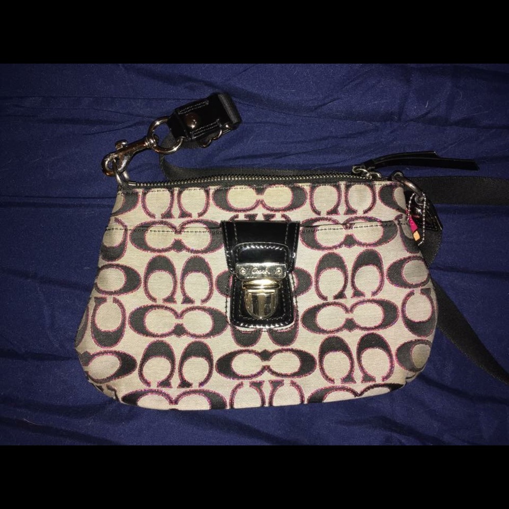 Black, white, and pink Coach crossbody bag