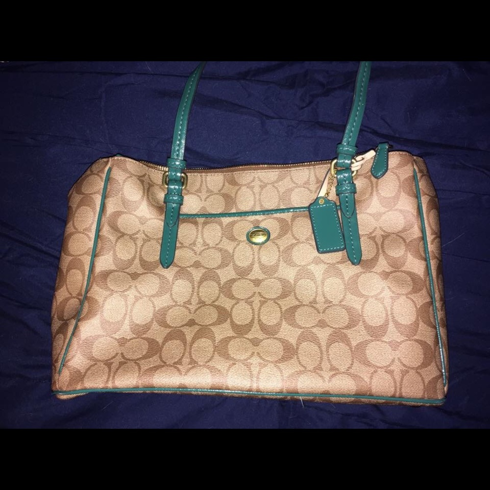 Large tan and teal Coach tote