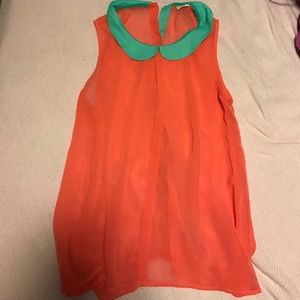 Salmon colored sheer blouse