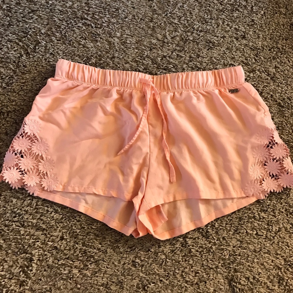 Pink cutout flower trim shorts