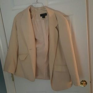 Beige woman's blazer.