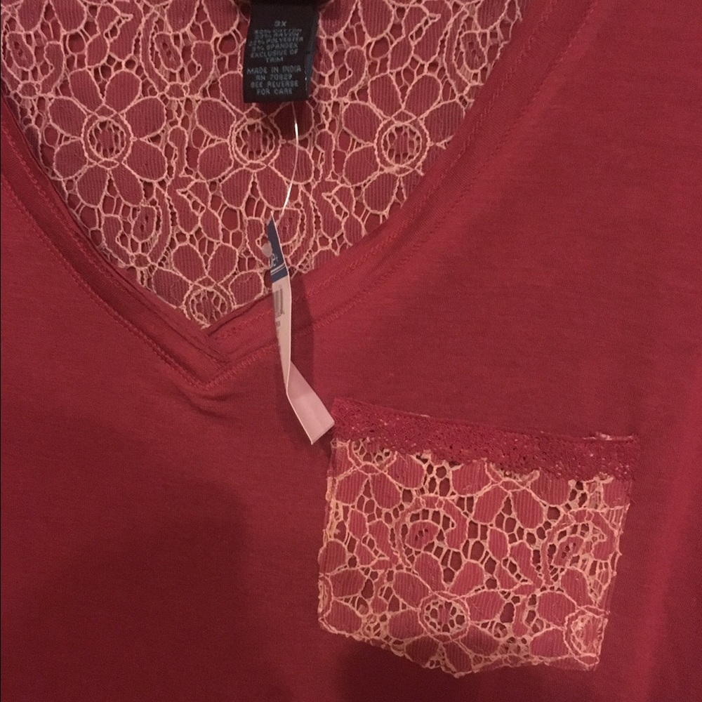 New with tags! V neck Blouse w lace pocket.