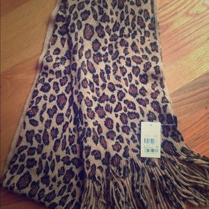 Fierce leopard scarf with shimmer detail.