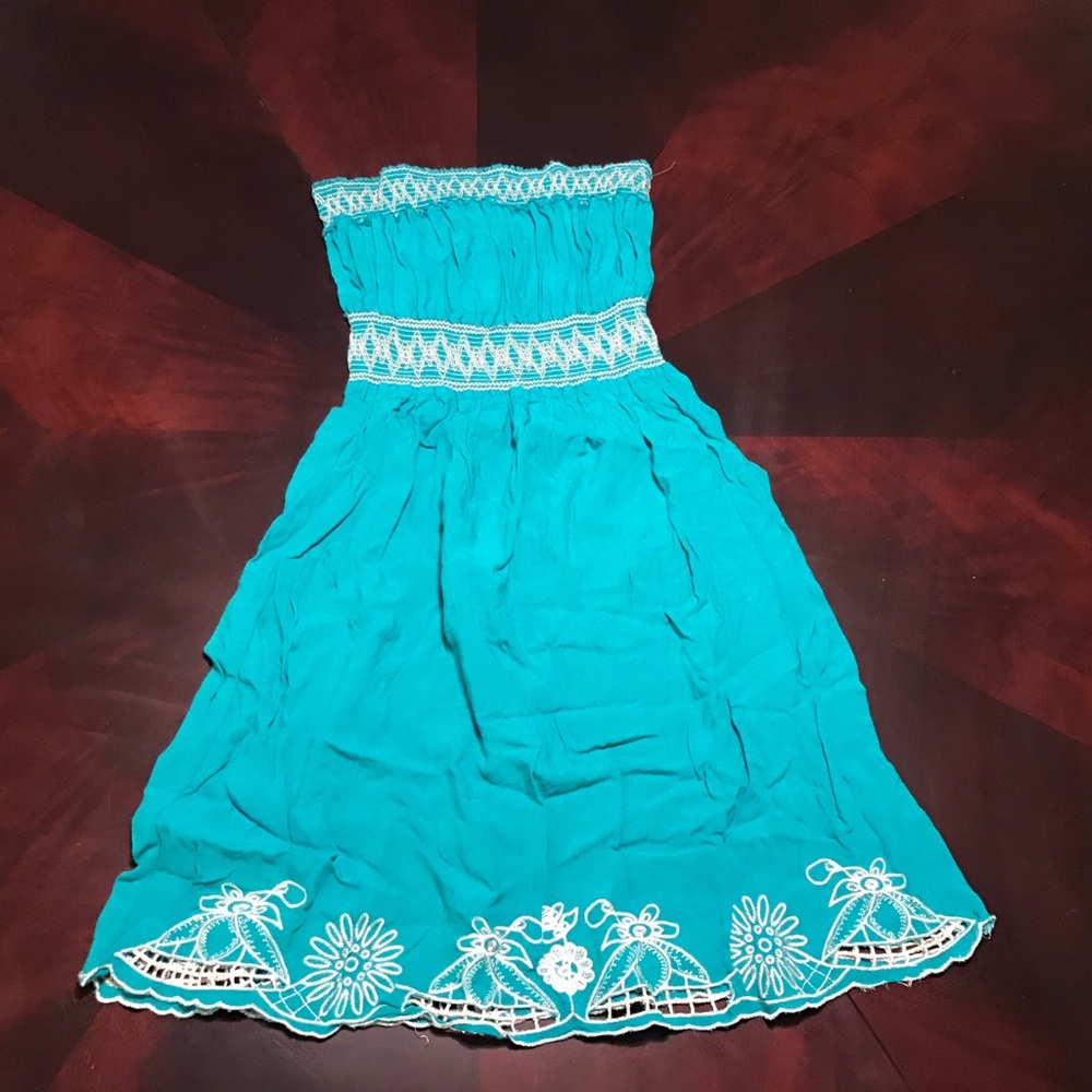 Teal strapless dress.