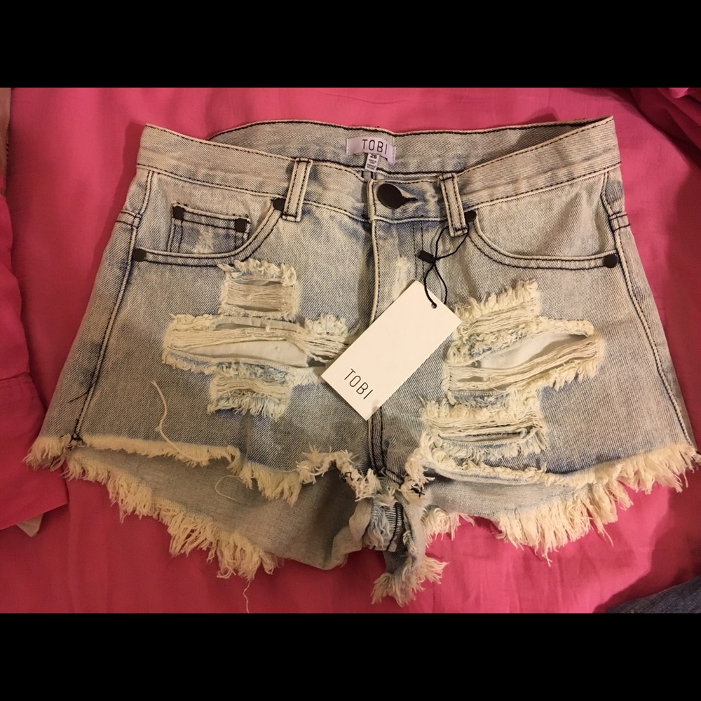 Ripped, high waisted denim shorts