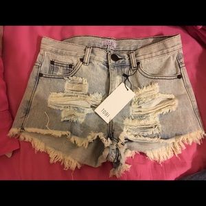 Ripped, high waisted denim shorts