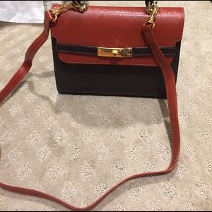 Looks similar to a mini Birkin Bag