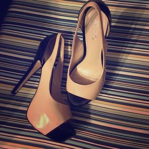 Black and nude platform pumps
