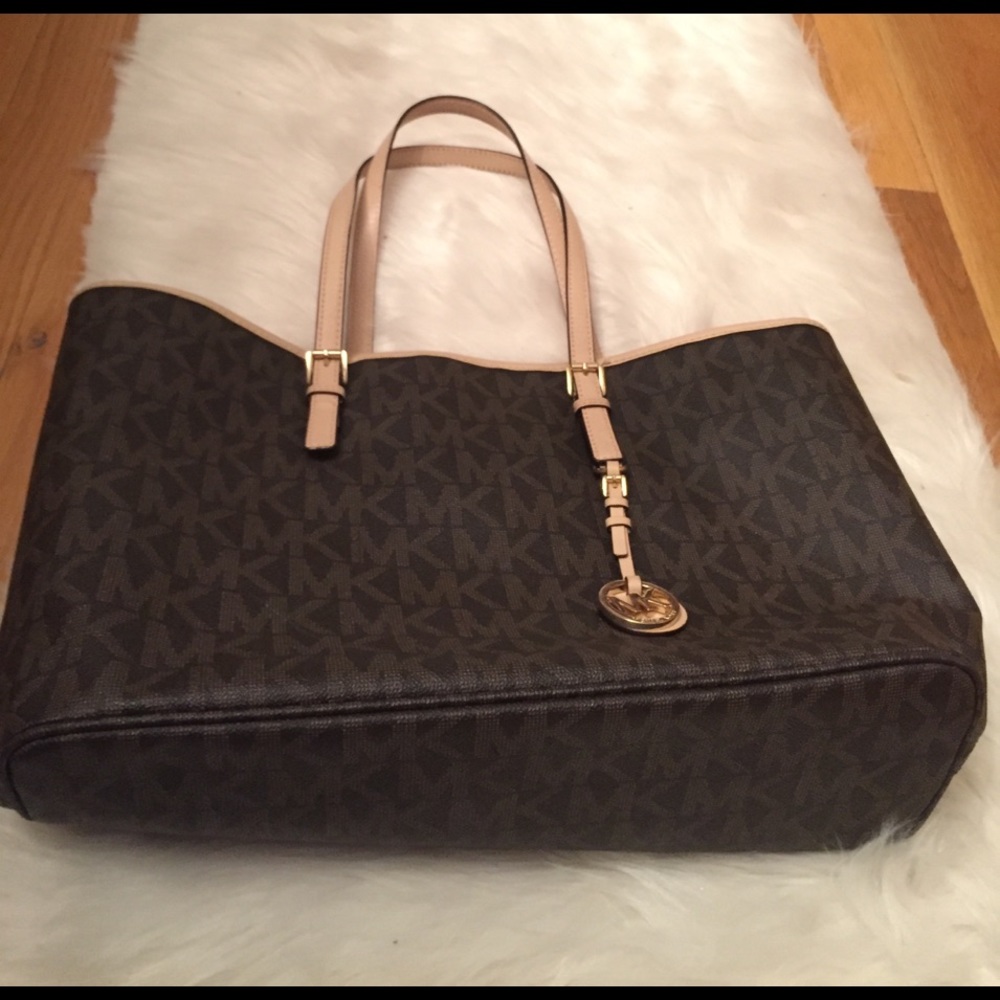 Authentic MK jet set travel tote