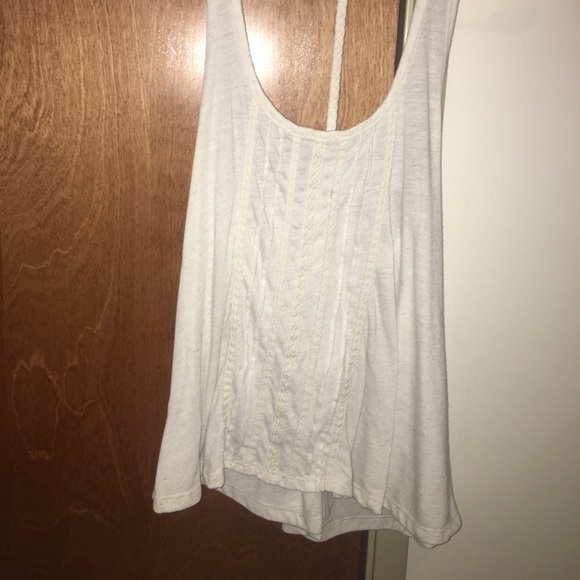 An assortment of crop tops and tank tops - Picture 2 of 8