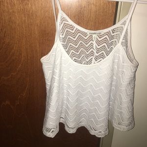 An assortment of crop tops and tank tops