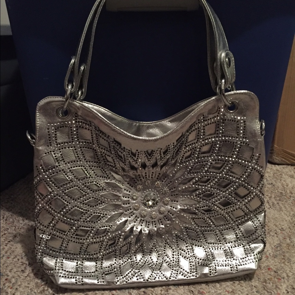 Shoulder bag cross body strap and matching wallet.