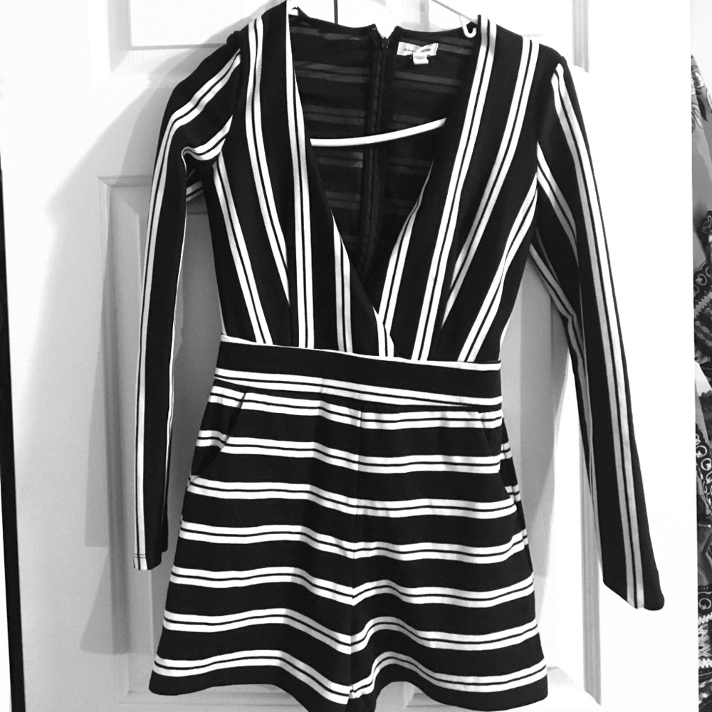 Deep V cut romper.