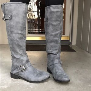 Knee high grey distressed zipper boots