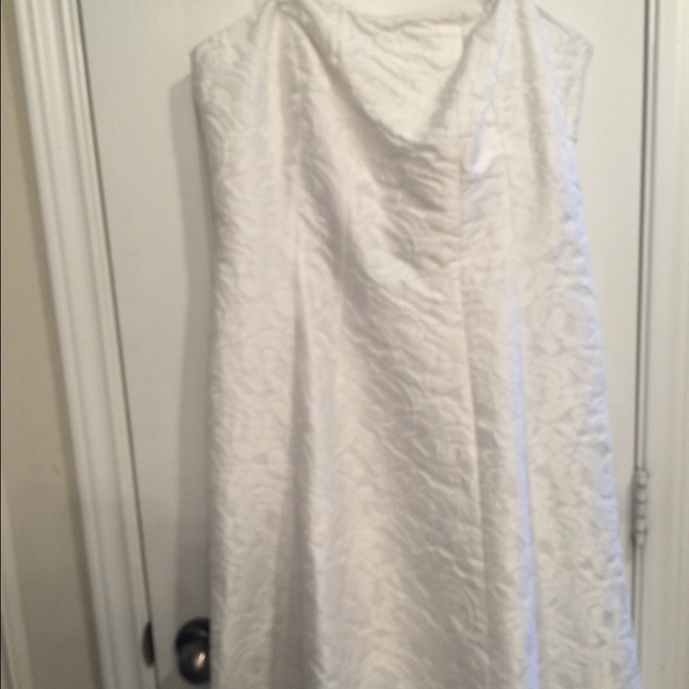 Dress price on tag is 340 but I only paid 199