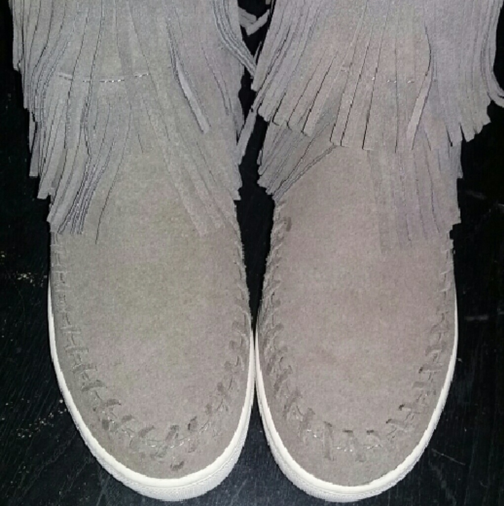 Tan fringe shoes