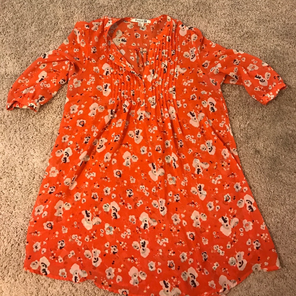 Orange floral mini dress.