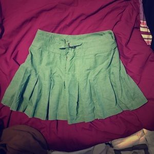 Green and brown pleated skirt