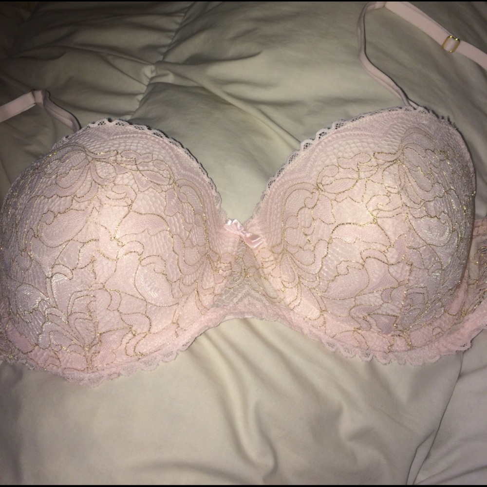 Pink and gold lacy bra